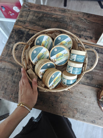 Handmade Nana Latta tallow skincare range in a basket, made in Belgium under EU cosmetic law