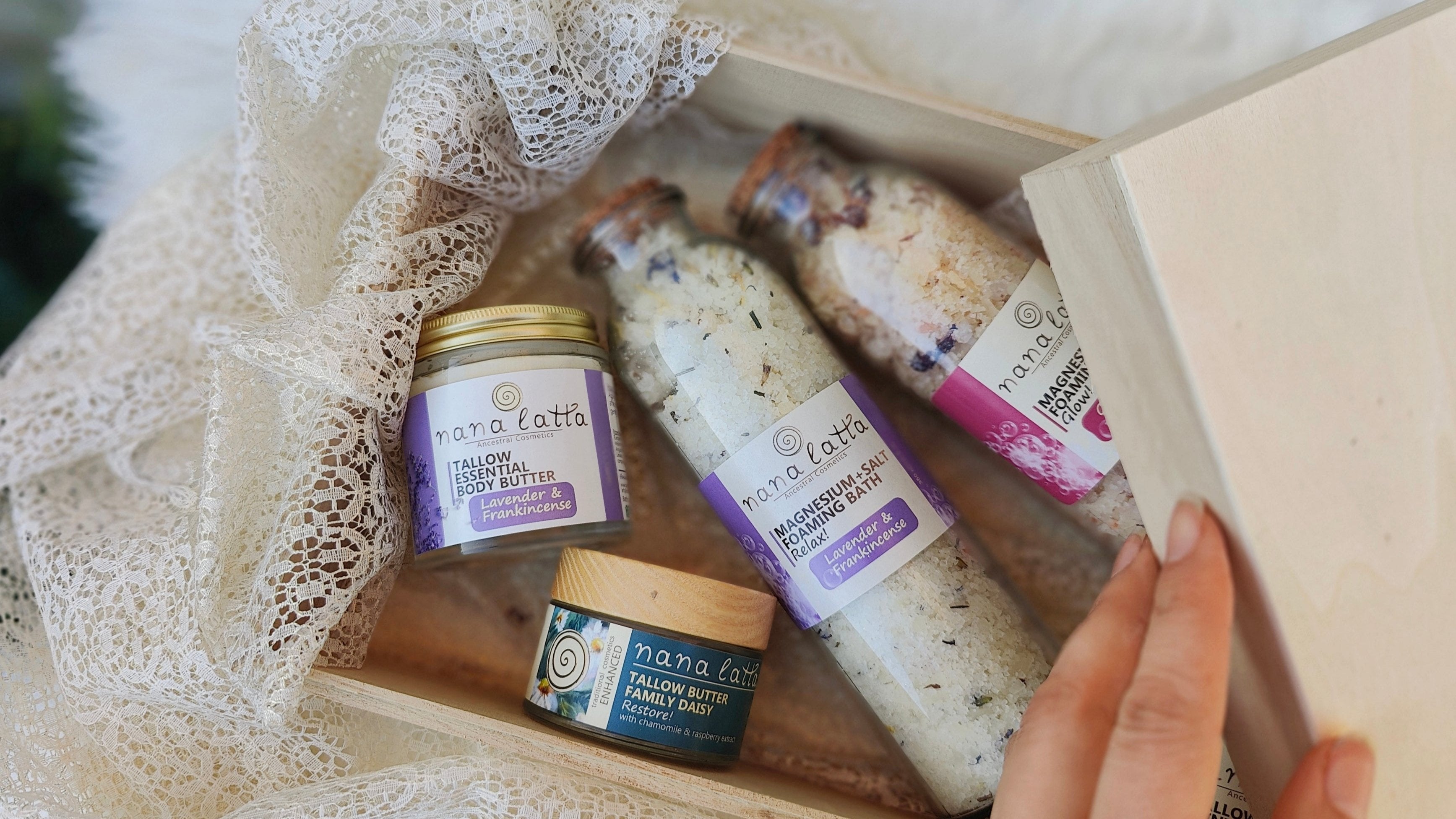Nana Latta Skincare gift set – jars and bath salts in a wooden box with soft fabric.