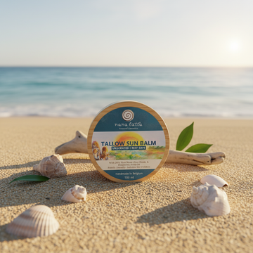 Tallow Sun Balm on the beach with sea background